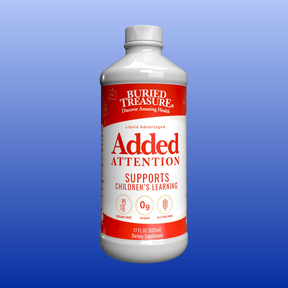 Bottle of Buried Treasure Added Attention supplement on a blue background