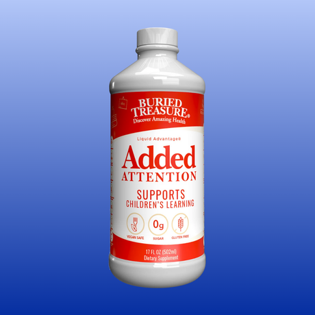 Bottle of Buried Treasure Added Attention supplement on a blue background