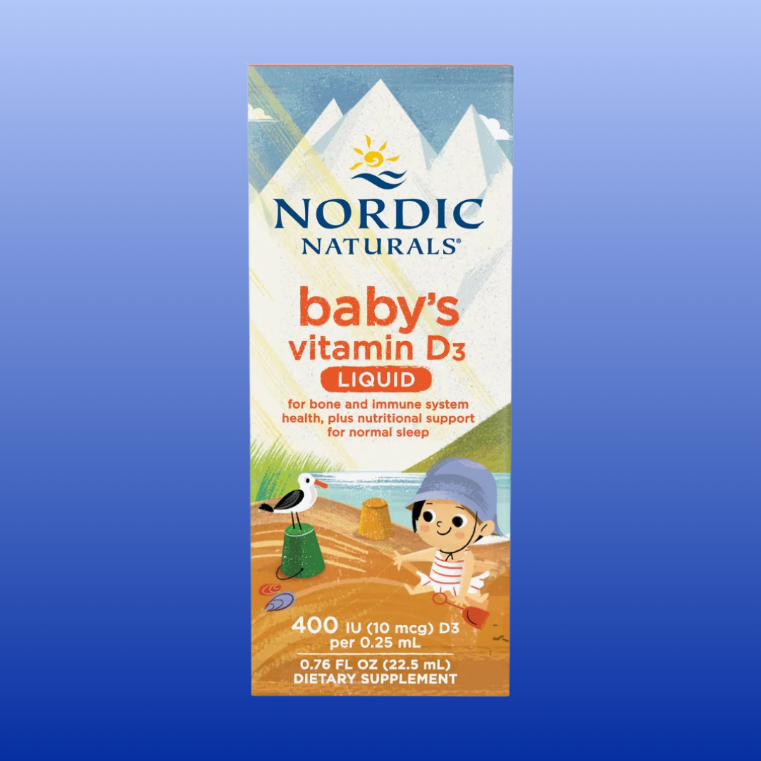 Nordic Naturals Baby's Vitamin D3 Liquid dietary supplement box, featuring a colorful cartoon illustration of a child and a seagull on a beach, set against a blue gradient background.