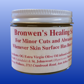 Bronwen's Healing Salve jar with label showing ingredients and uses for minor cuts and abrasions on skin
