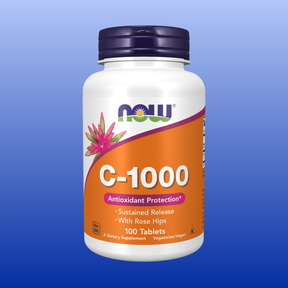 Bottle of Now brand C-1000 Vitamin C sustained release tablets with rose hips, 100 count dietary supplement.