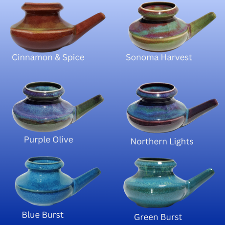 Six hand-fired ceramic neti pots in various colors for nasal rinse and sinus health shown on blue background