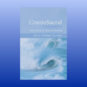 Cover of the book CranioSacral Therapy by John E. Upledger featuring ocean waves and blue tones.