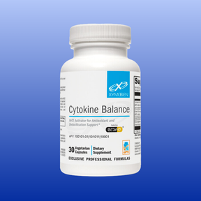 White bottle of Cytokine Balance dietary supplement with 30 vegetarian capsules by Xymogen on blue background