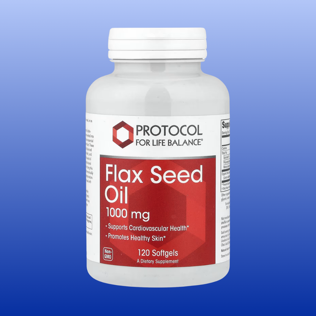 Bottle of Protocol for Life Balance Flax Seed Oil on a blue background