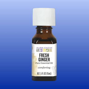 Bottle of Aura Cacia Fresh Ginger pure essential oil 0.5 oz with white cap and label on blue background