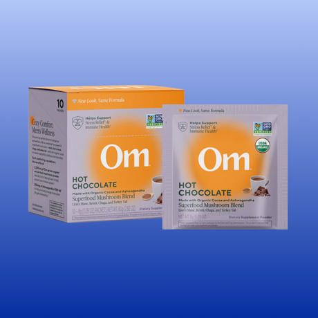 Om Hot Chocolate packaging on a blue background