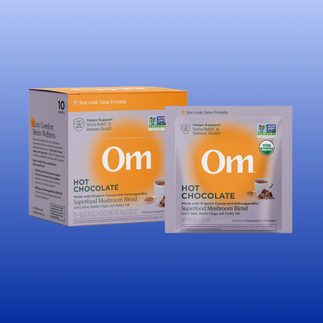 Om Hot Chocolate packaging on a blue background
