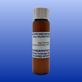 Brown bottle of Kali Mur 6X lactose-free cell salt granules by Helios Homeopathy with white cap and label