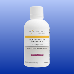 Bottle of Integrative Therapeutics Liquid Calcium Magnesium 1:1 ratio, berry flavored, 16 oz dietary supplement.