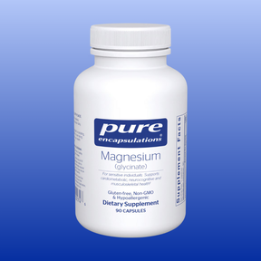 Pure Encapsulations Magnesium Glycinate 120 mg dietary supplement bottle with 90 vegan capsules on blue background