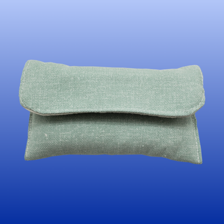 Compact green textile pouch kit for infant homeopathic remedies, fits easily in diaper bag for travel use.