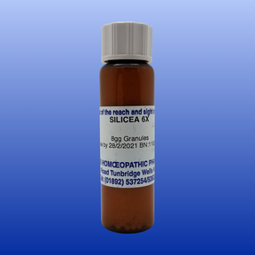 Brown bottle of Silicea 6X lactose free homeopathic cell salt granules with white cap and label