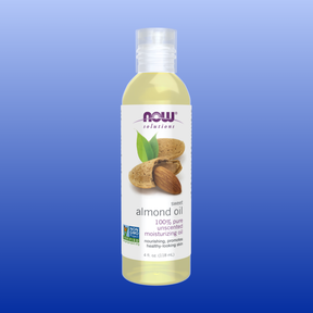 Bottle of Now Solutions Sweet Almond Oil 4 oz with almond nuts and leaves on label for moisturizing skin care