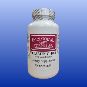 Bottle of Ecological Formulas Vitamin C 1000 mg dietary supplement with 120 corn-free capsules on blue background